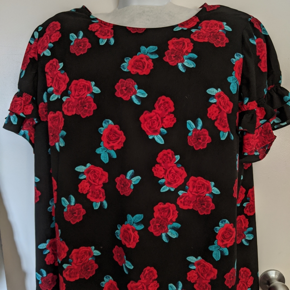 Black blouse with red roses